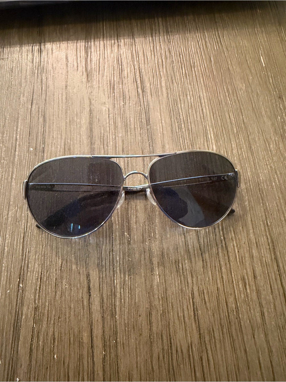 Oakley Silver Frame Black Lens Aviator Sunglasses